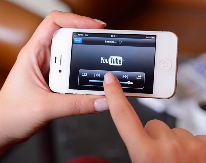 smartphone with YouTube app pulled up