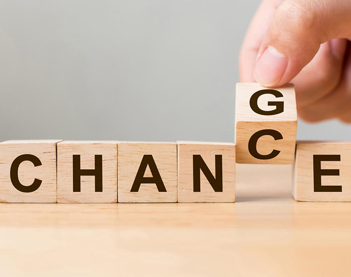 letter cubes spell chance and the c is being flipped to g for change