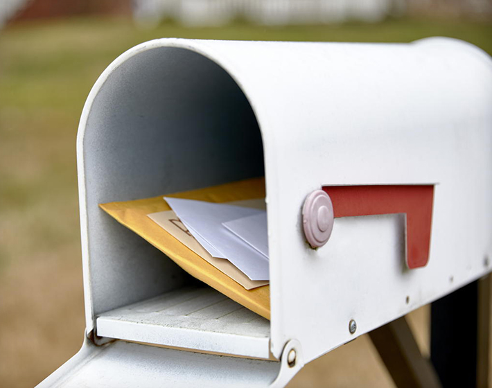 an open mailbox represents slow USPS service for direct mail campaigns