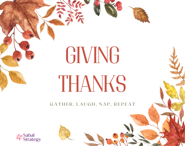 autumn leaves surround text reading giving thanks