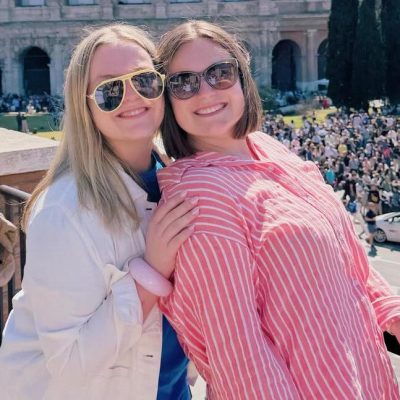 Making memories with the two Jenkins daughters and the coliseum in the background