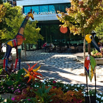colorful artwork amid flowerbeds in downtown Greenville, SC